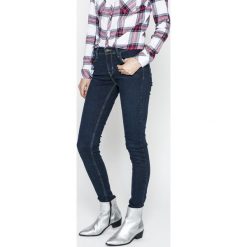 Levi's - Jeansy 710. Brązowe jeansy damskie rurki Levi's®, z aplikacjami, z bawełny. W wyprzedaży za 329,90 zł.