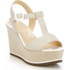 Buty damskie. Koturny damskie Wittchen, bez obcasa, na szpilce, ze sprzączką. W wyprzedaży za 279,90 zł.