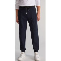 Melanżowe joggery z lampsami - Granatowy. Niebieskie spodnie męskie Reserved, s, bez wzorów. Za 119,99 zł.
