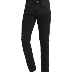Nudie Jeans TIGHT TERRY Jeans Skinny Fit black dirt. Czarne jeansy męskie marki Nudie Jeans, m, bez wzorów. Za 539,00 zł.