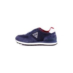 Buty Guess FM6CHAFAB12. Niebieskie trampki męskie Guess, z aplikacjami, bez zapięcia. Za 398,26 zł.