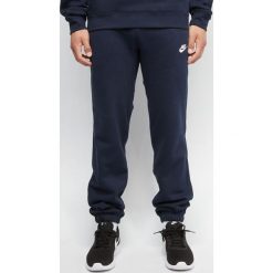 Spodnie dresowe męskie NIKE granat. Niebieskie spodnie męskie Nike, na imprezę, s, bez wzorów, z bawełny. Za 159,90 zł.