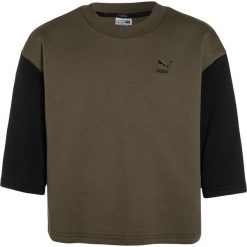 Puma EVO CREW Bluza olive night. Brązowe bluzy dziewczęce marki Puma, z bawełny. W wyprzedaży za 126,75 zł.