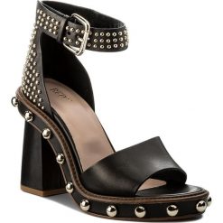 Sandały RED VALENTINO - PQ2S0A27 Nero 0NO. Czarne klapki damskie marki Red Valentino, bez wzorów, ze skóry, bez obcasa, na obcasie. W wyprzedaży za 1899,00 zł.