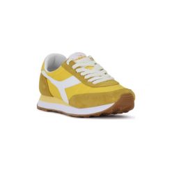 Buty Diadora 021 KOALA H. Żółte trampki i tenisówki damskie Diadora, bez wzorów, bez zapięcia. Za 334,28 zł.