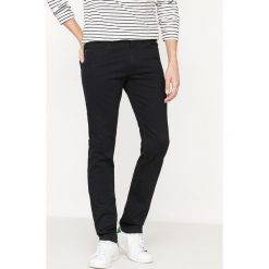 Dżinsy o kroju slim z denim ze stretchem. Czarne jeansy męskie slim marki La Redoute Collections. Za 141,08 zł.