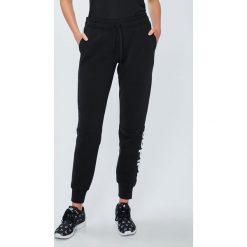 Adidas Performance - Spodnie Ess Lin. Czarne legginsy sportowe damskie adidas Performance, s, bez wzorów, z bawełny. Za 169,90 zł.