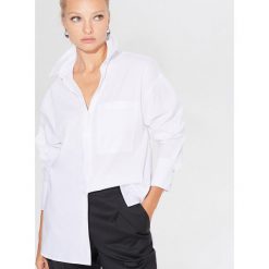 Koszula oversize z lyocellem TENCEL™ - Biały. Białe koszule damskie Mohito, bez wzorów, z lyocellu, bez kołnierzyka, bez rękawów. Za 139,99 zł.