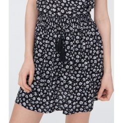 Wzorzysta spódnica mini - Brązowy. Pomarańczowe spódniczki damskie Sinsay, s, bez wzorów, mini. Za 29,99 zł.