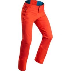 Spodnie turystyczne zimowe SH520 x-warm męskie. Pomarańczowe spodnie męskie QUECHUA, na zimę, m, bez wzorów, z elastanu. Za 229,99 zł.