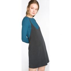 Jakub Polanka x Bibloo Iris. Podkoszulek Czarny. Czarne podkoszulki damskie Jakub Polanka x Bibloo, s, bez wzorów, z poliesteru, bez kołnierzyka, bez rękawów. Za 430,95 zł.