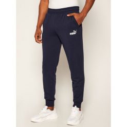Spodnie dresowe Puma Ess Logo 851754. Niebieskie jeansy męskie Puma, xl, bez wzorów. Za 179,99 zł.