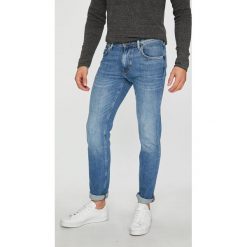 Tommy Hilfiger - Jeansy. Niebieskie jeansy męskie z dziurami TOMMY HILFIGER. Za 399,90 zł.