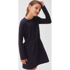 Mango Kids - Sukienka dziecięca Luna 110-152 cm. Niebieskie sukienki dziewczęce Mango Kids, bez wzorów, z elastanu, casualowe, z długim rękawem, długie, maxi, rozkloszowane. W wyprzedaży za 59,90 zł.