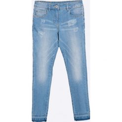 Blukids - Jeansy dziecięce 134-164 cm. Niebieskie jeansy dziewczęce marki Blukids, z bawełny. W wyprzedaży za 49,90 zł.