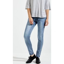 Jeansy typu skinny. Jeansy damskie Moodo, s, z jeansu. Za 9,99 zł.