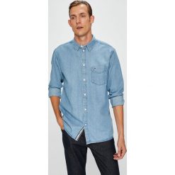 Tommy Jeans - Koszula. Niebieskie koszule męskie Tommy Jeans, m, bez wzorów, z bawełny, klasyczne, z klasycznym kołnierzykiem, z długim rękawem. W wyprzedaży za 199,90 zł.