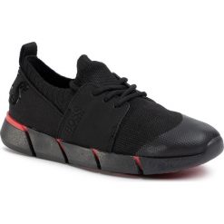 Sneakersy BOSS - J29216 S 09B. Czarne trampki chłopięce Boss, bez wzorów, ze skóry ekologicznej, na sznurówki. Za 399,00 zł.