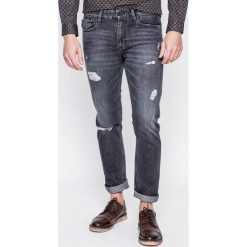 Calvin Klein Jeans - Jeansy. Szare jeansy męskie Calvin Klein Jeans, z aplikacjami, z podwyższonym stanem. W wyprzedaży za 399,90 zł.