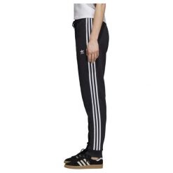 DAMSKIE SPODNIE DRESOWE ADIDAS (38). Czarne spodnie damskie Adidas, w paski, z bawełny, z standardowym stanem. W wyprzedaży za 199,99 zł.