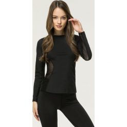 Cardio Bunny - Bluzka Warsaw. Czarne bluzki damskie Cardio Bunny, s, bez wzorów, z elastanu, z okrągłym kołnierzem. W wyprzedaży za 129,90 zł.