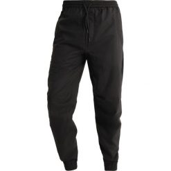 Spodnie dresowe męskie: Maharishi SEAMLESS TRACK PANTS Spodnie treningowe black