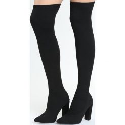 Czarne Kozaki Sublimity. Czarne buty zimowe damskie marki Born2be, ze szpiczastym noskiem, na wysokim obcasie, na słupku. Za 119,99 zł.