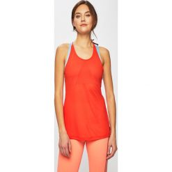 Reebok - Top. Pomarańczowe topy damskie Reebok, s, bez wzorów, z poliesteru, bez rękawów. Za 99,90 zł.