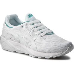 Sneakersy ASICS - TIGER Gel-Kayano Trainer Evo H7Q6N White/White 0101. Białe półbuty damskie marki Asics, na co dzień, bez wzorów, z tworzywa sztucznego, bez obcasa, na płaskiej podeszwie, bez zapięcia. W wyprzedaży za 249,00 zł.