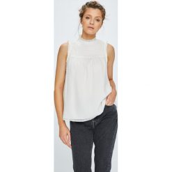 Tommy Jeans - Top. Białe bluzki damskie marki Tommy Jeans, s, z poliesteru, bez rękawów. W wyprzedaży za 219,90 zł.