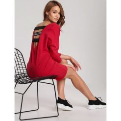 Czerwona Tunika Rhaegale. Czerwone sukienki damskie Renee, xl, bez wzorów, z dzianiny, bez kołnierzyka, bez rękawów. W wyprzedaży za 79,99 zł.