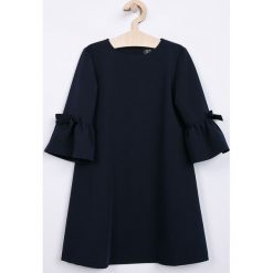 Sly - Sukienka dziecięca 128-164 cm. Niebieskie sukienki dziewczęce SLY, bez wzorów, z elastanu, eleganckie, bez rękawów, mini, proste. W wyprzedaży za 159,90 zł.