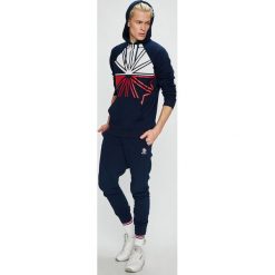 Reebok Classic - Bluza. Niebieskie bluzy męskie Reebok Classic, s, z nadrukiem, z bawełny, z kapturem, bez rękawów, z kapturem. W wyprzedaży za 219,90 zł.