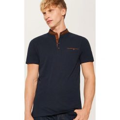 Koszulka polo ze stójką - Granatowy. Niebieskie koszulki męskie House, s, bez wzorów, bez rękawów. Za 59,99 zł.