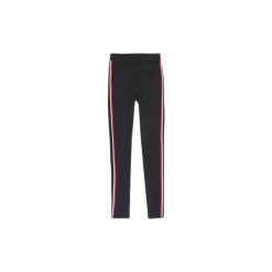 Legginsy damskie. Czerwone legginsy marki TXM, z elastanu. Za 24,99 zł.