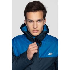 Kurtka narciarska męska KUMN351R - granat melanż. Pomarańczowe kurtki sportowe męskie marki 4f, m, melanż, z kapturem, narciarskie. W wyprzedaży za 279,99 zł.