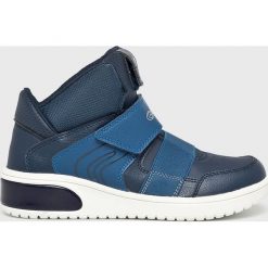 Geox - Buty dziecięce. Czarne trampki chłopięce Geox, bez wzorów, z gumy, sportowe, z okrągłym noskiem, bez zapięcia. W wyprzedaży za 349,90 zł.