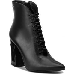 Botki CARINII - B4181 E50-000-PSK-C28. Czarne buty zimowe damskie marki Carinii, ze skóry, na obcasie. W wyprzedaży za 239,00 zł.
