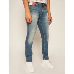 Jeansy Slim Fit Tommy Jeans Scanton DM0DM08252. Niebieskie jeansy męskie Tommy Jeans, m, bez wzorów. Za 539,00 zł.