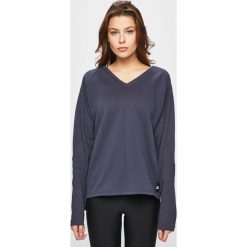 Reebok - Bluza. Niebieskie bluzy damskie Reebok, s, z nadrukiem, z bawełny, bez rękawów, bez kaptura. W wyprzedaży za 199,90 zł.