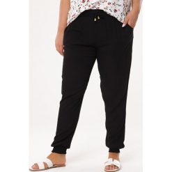 Czarne Spodnie Lid. Czarne spodnie damskie Born2be, xl, z tkaniny. Za 39,99 zł.
