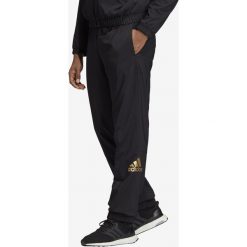 Adidas Performance ID Grind Spodnie dresowe Czarny. Czarne spodnie męskie adidas Performance, m, z nadrukiem, z poliesteru. Za 266,95 zł.