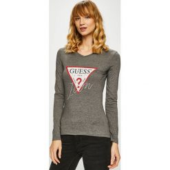 Guess Jeans - Bluzka. Czarne bluzki damskie Guess Jeans, s, z nadrukiem, z bawełny, z okrągłym kołnierzem. W wyprzedaży za 119,90 zł.