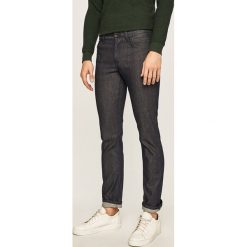Tommy Hilfiger Tailored - Spodnie x Mercedes. Niebieskie spodnie męskie Tommy Hilfiger Tailored, na co dzień, m, bez wzorów, z elastanu, casualowe. W wyprzedaży za 399,90 zł.
