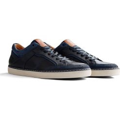 Skórzane sneakersy "Corby" w kolorze granatowym. Niebieskie sneakersy męskie Travelin', z okrągłym noskiem, na sznurówki. W wyprzedaży za 289,95 zł.