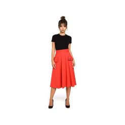 B046 Rozkloszowana spódnica midi z kieszeniami. Czarne spódniczki damskie BE, s, bez wzorów, z dzianiny, eleganckie, midi, rozkloszowane. Za 119,00 zł.