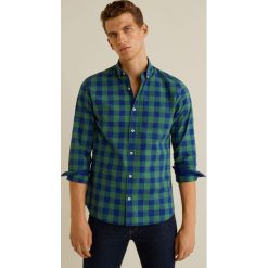 Mango Man - Koszula Claude. Żółte koszule męskie marki Mango Man, s, bez wzorów, z bawełny, button down, z długim rękawem. Za 139,90 zł.