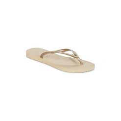 Japonki Havaianas SLIM CRYSTAL GLAMOUR SWAROVSKI. Żółte klapki damskie Havaianas, bez wzorów, bez obcasa. W wyprzedaży za 104,30 zł.