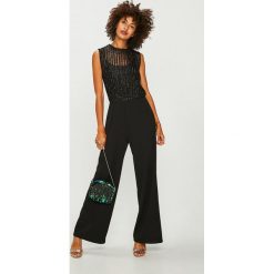 Vero Moda - Kombinezon Shane. Czarne kombinezony damskie marki Vero Moda, s, bez wzorów, z elastanu, z okrągłym kołnierzem, bez rękawów. W wyprzedaży za 139,90 zł.