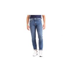 Jeansy slim fit Calvin Klein Jeans J30J307629. Niebieskie jeansy męskie marki Calvin Klein Jeans, z jeansu. Za 328,31 zł.